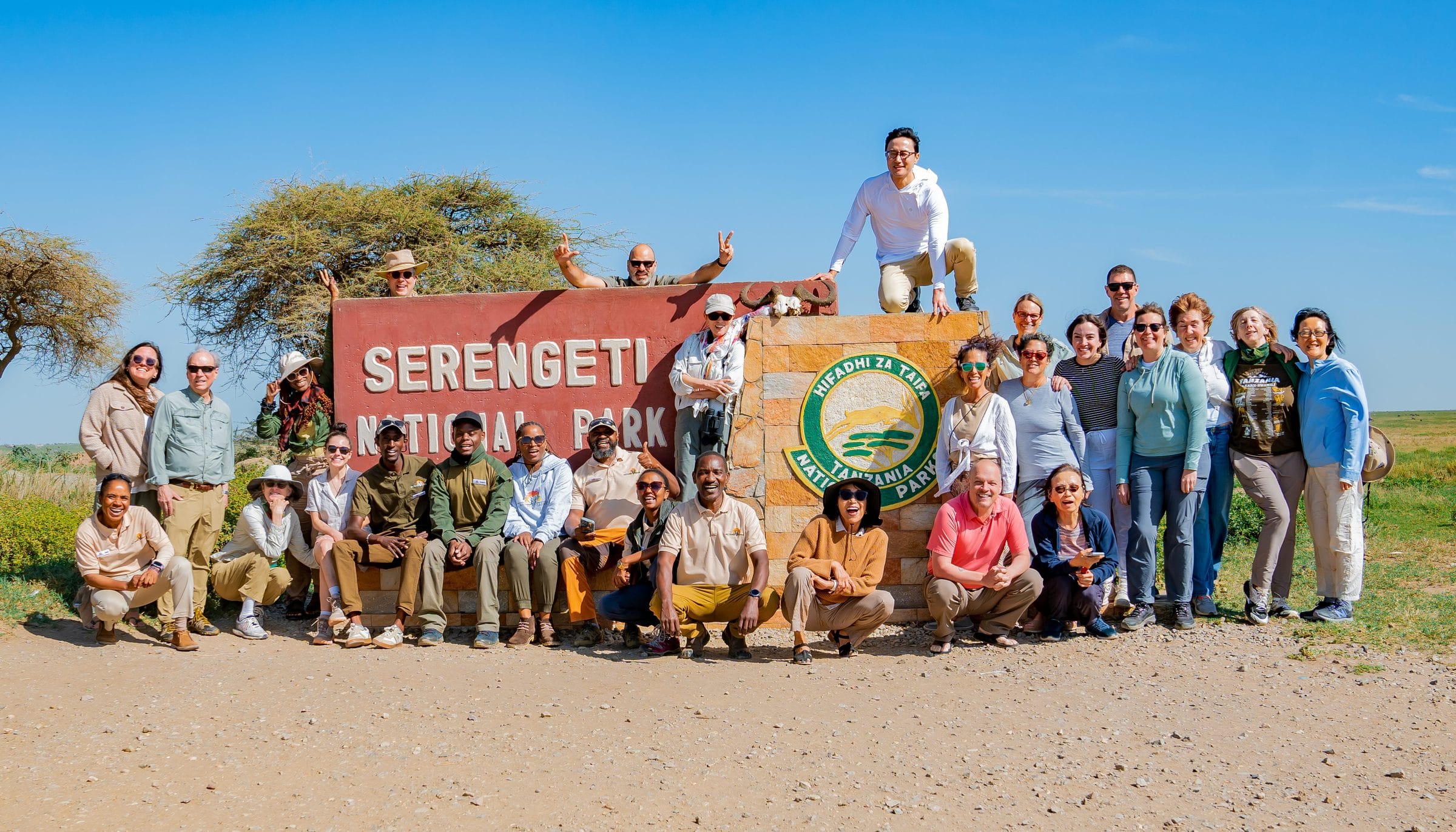 A travel advisor FAM group at the Serengeti National Park gate