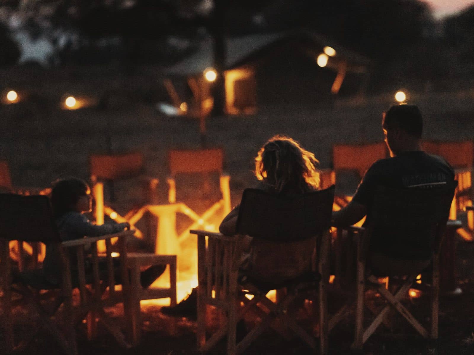 Guests gathered around the evening campfire at Conserve Safari Camp, Tarangire